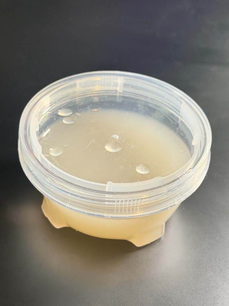 Gold-white Special Big Jelly slime in a round container